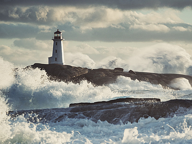 Leuchtturm an Kanadas Atlantikküste mit starken Wellen als Highlight einer Sprachreise