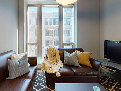 Gemütlicher Wohnbereich der Residenz in Montréal, perfekt für deine Sprachreise und gemeinsame Gespräche auf Französisch im Alltag